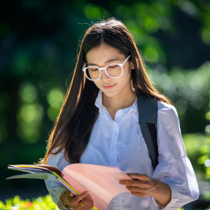 A student looks to coursebook