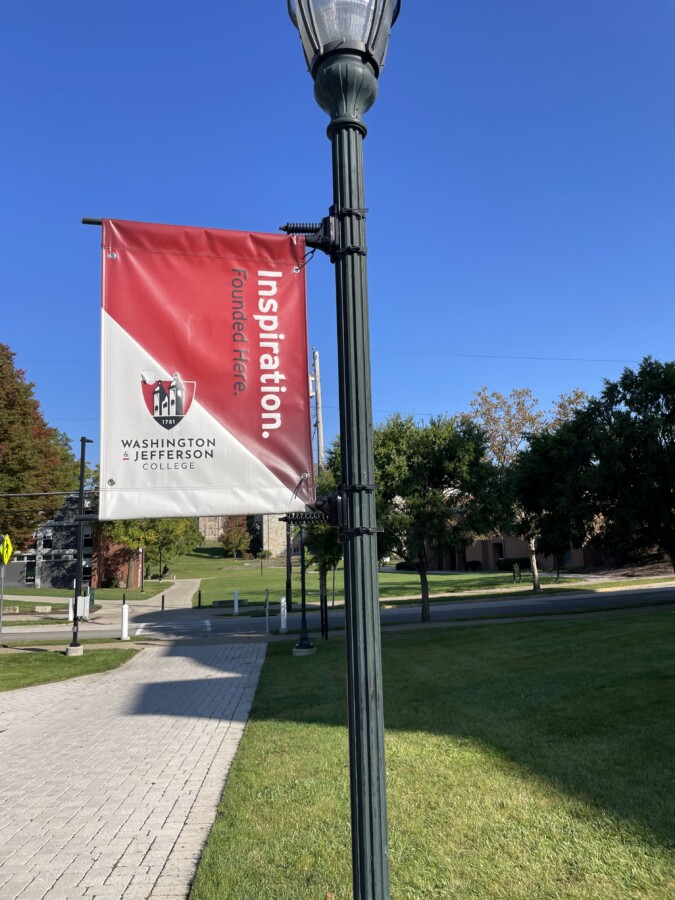 A flag on campus that reads: Inspiration. Founded Here.