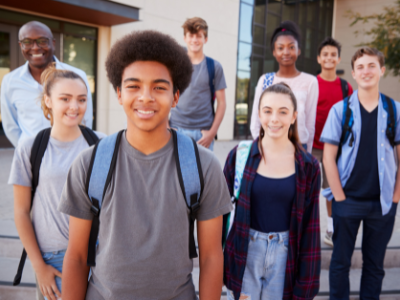 Students standing outside the school